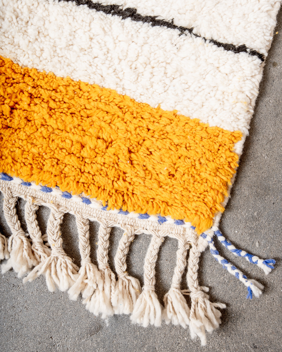 Modern, designer, handcrafted Berber rug from Morocco. Beniourain carpet with beautiful colours and patterns and fluffy wool texture.